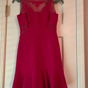 Cocktail dress with lace inserts